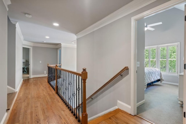 4250 Old Oak Trce, Cumming, GA 30041 - hallway with an upstairs landing, baseboards, ornamental molding, recessed lighting, and wood finished floors