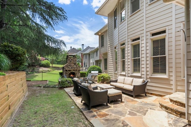 4250 Old Oak Trce, Cumming, GA 30041 - view of patio / terrace with an outdoor living space with a fireplace