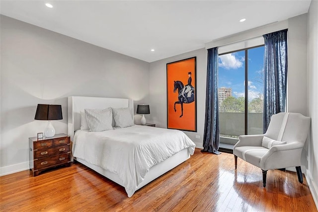 2575 Peachtree Rd NE Unit 11D, Atlanta, GA 30305 - bedroom with light hardwood / wood-style flooring