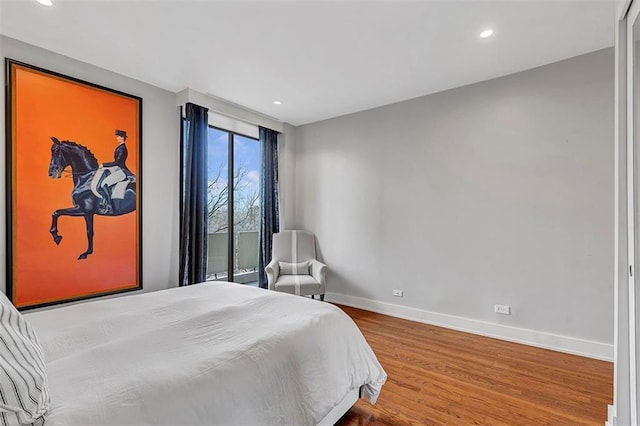 2575 Peachtree Rd NE Unit 11D, Atlanta, GA 30305 - bedroom with hardwood / wood-style flooring