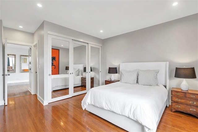 2575 Peachtree Rd NE Unit 11D, Atlanta, GA 30305 - bedroom featuring a closet, hardwood / wood-style flooring, and french doors