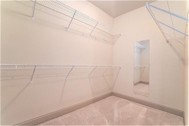 3175 Rock Port Cir, Norcross, GA 30092 - walk in closet featuring carpet flooring