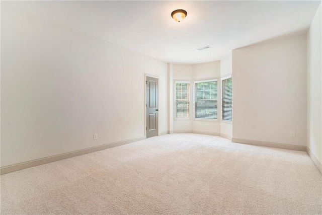 3175 Rock Port Cir, Norcross, GA 30092 - unfurnished room featuring light colored carpet and baseboards