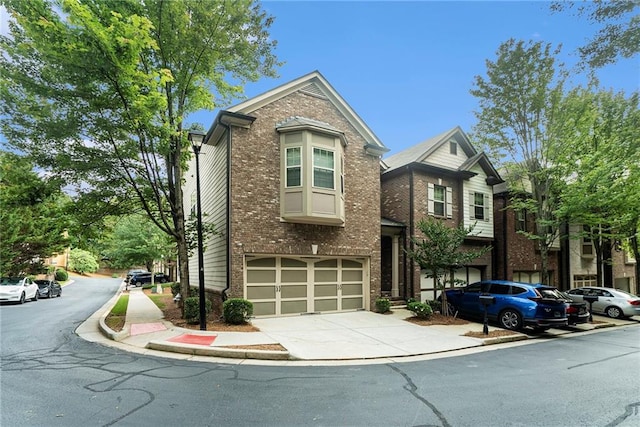 3175 Rock Port Cir, Norcross, GA 30092 - view of front of property featuring brick siding, driveway, and an attached garage