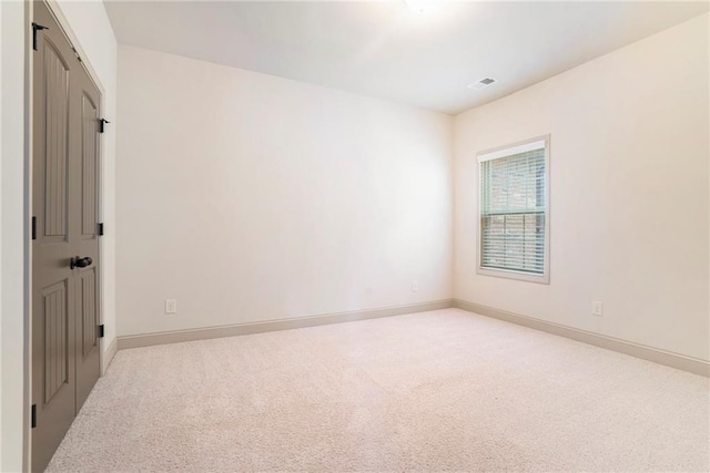 3175 Rock Port Cir, Norcross, GA 30092 - spare room with light carpet and baseboards