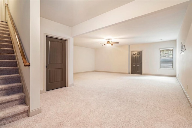 3175 Rock Port Cir, Norcross, GA 30092 - below grade area featuring carpet flooring, ceiling fan, stairs, and baseboards
