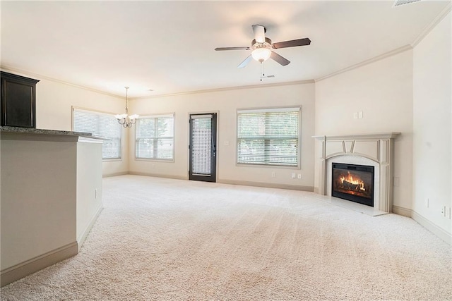 3175 Rock Port Cir, Norcross, GA 30092 - unfurnished living room with a chandelier, light colored carpet, ornamental molding, a ceiling fan, and healthy amount of natural light