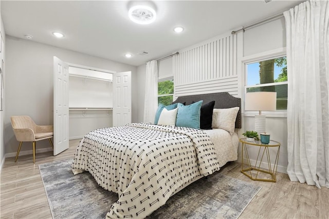 1770 Atherton Dr, Decatur, GA 30035 - bedroom with baseboards, wood finished floors, a closet, and recessed lighting