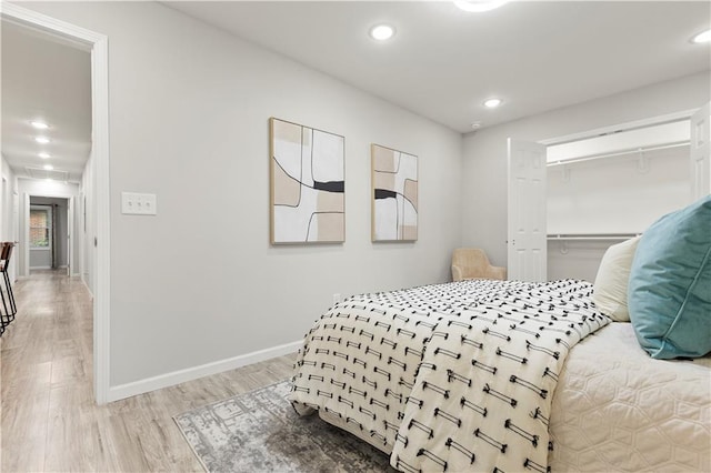 1770 Atherton Dr, Decatur, GA 30035 - bedroom with wood finished floors, baseboards, recessed lighting, and a closet