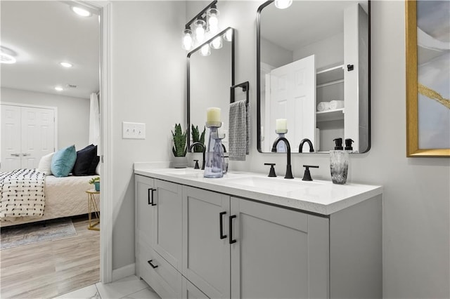 1770 Atherton Dr, Decatur, GA 30035 - full bathroom with double vanity, recessed lighting, baseboards, and ensuite bathroom