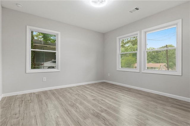 1770 Atherton Dr, Decatur, GA 30035 - spare room featuring light wood-style floors, baseboards, and a smoke detector