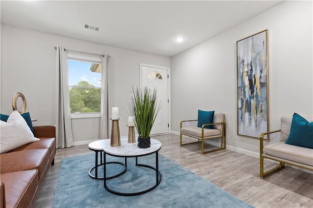 1770 Atherton Dr, Decatur, GA 30035 - living room featuring wood finished floors, baseboards, and recessed lighting