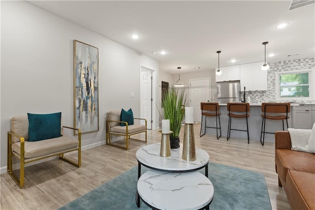 1770 Atherton Dr, Decatur, GA 30035 - living area with light wood-type flooring, recessed lighting, and baseboards