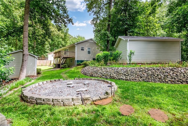 24 Arrow Ct, Lavonia, GA 30553 - view of green lawn with stairs, a wooden deck, and a shed