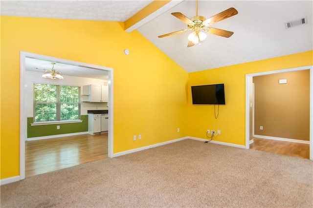 24 Arrow Ct, Lavonia, GA 30553 - unfurnished living room featuring light carpet, a chandelier, a ceiling fan, and light wood-style flooring