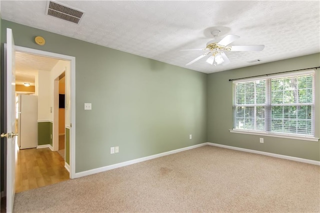 24 Arrow Ct, Lavonia, GA 30553 - carpeted empty room featuring ceiling fan, a smoke detector, and a textured ceiling
