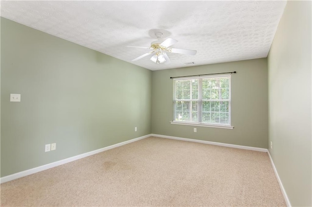 24 Arrow Ct, Lavonia, GA 30553 - spare room with light colored carpet, a ceiling fan, and a textured ceiling