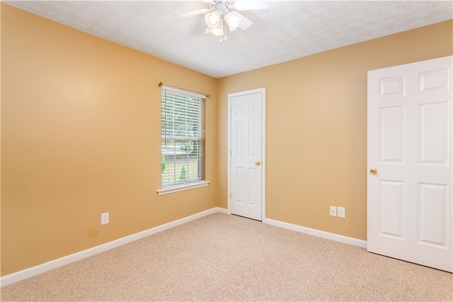 24 Arrow Ct, Lavonia, GA 30553 - unfurnished bedroom with light colored carpet and a ceiling fan