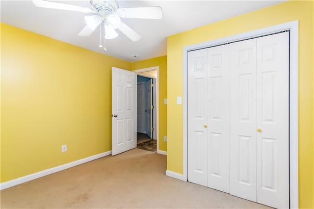 24 Arrow Ct, Lavonia, GA 30553 - unfurnished bedroom with light colored carpet, a closet, and ceiling fan