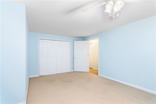 24 Arrow Ct, Lavonia, GA 30553 - unfurnished bedroom featuring a closet, carpet, and ceiling fan
