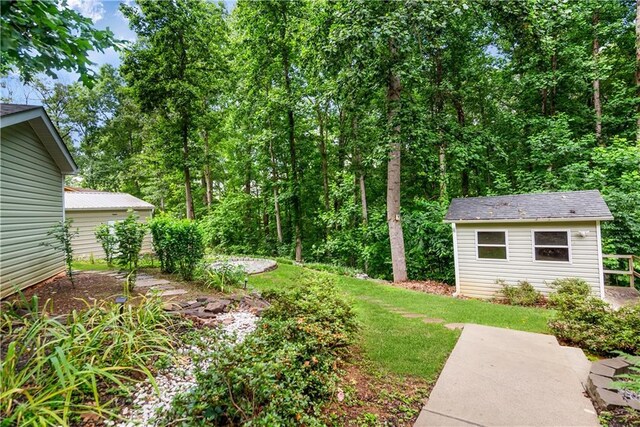 24 Arrow Ct, Lavonia, GA 30553 - view of yard featuring an outdoor structure