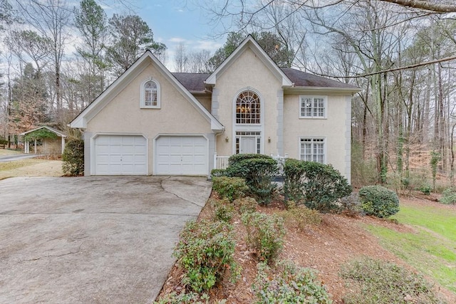 view of front of property with a garage