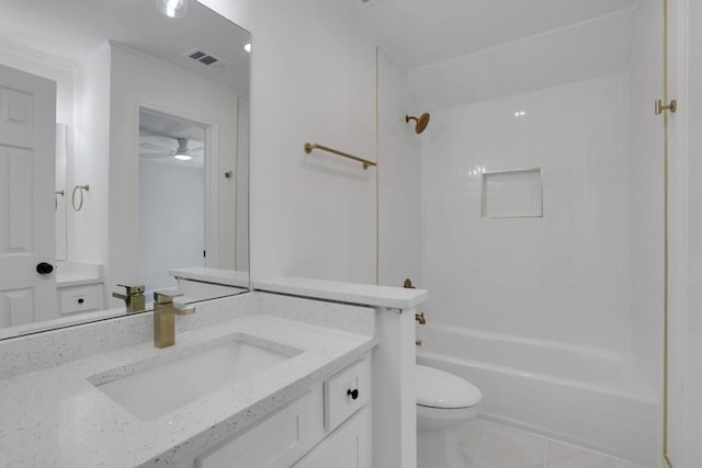 bathroom with visible vents, toilet, tile patterned flooring, tub / shower combination, and vanity