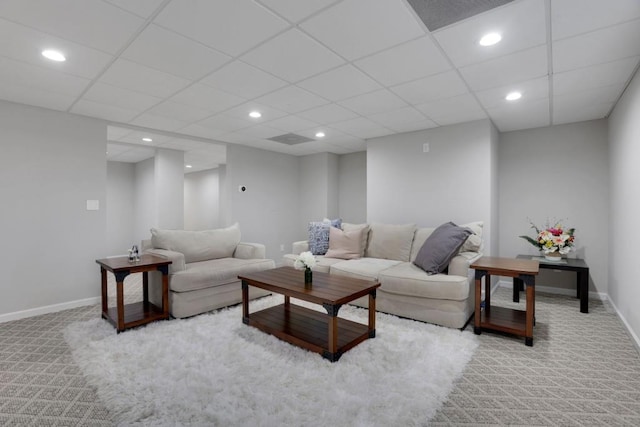 living area featuring carpet, visible vents, baseboards, and recessed lighting