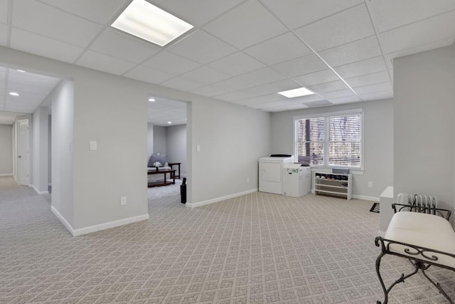 interior space with light carpet, baseboards, a paneled ceiling, separate washer and dryer, and recessed lighting