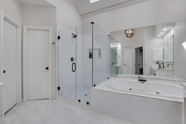 bathroom with marble finish floor, a stall shower, vanity, and a bath