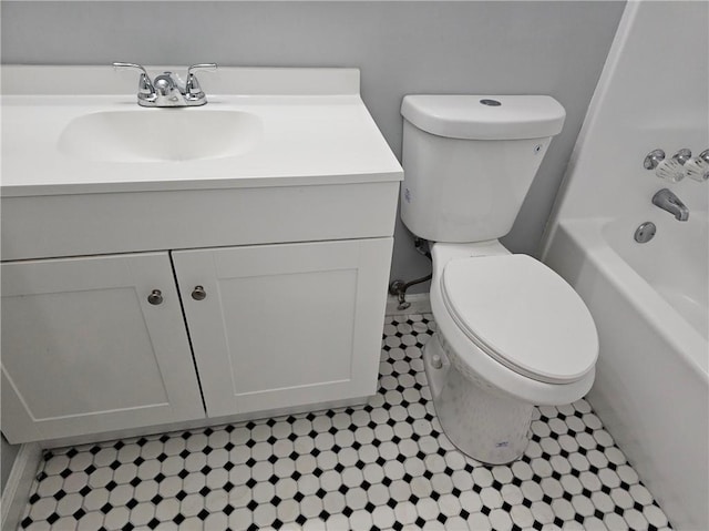 full bath with vanity and toilet