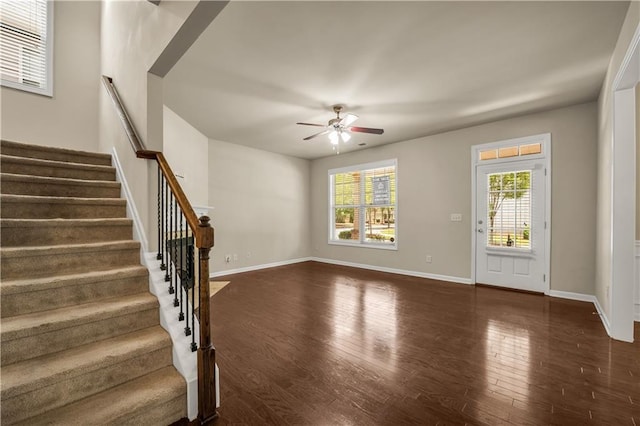 559 Myrle Trace Ln, Suwanee, GA 30024 - foyer entrance featuring a ceiling fan, dark wood-style floors, stairway, and baseboards