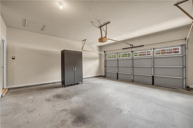 559 Myrle Trace Ln, Suwanee, GA 30024 - garage with a garage door opener and baseboards