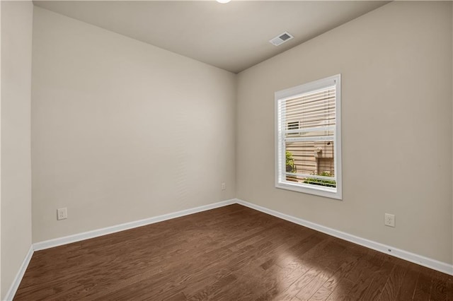559 Myrle Trace Ln, Suwanee, GA 30024 - spare room with dark wood finished floors and baseboards