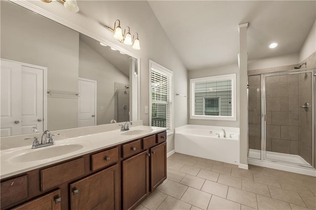559 Myrle Trace Ln, Suwanee, GA 30024 - full bath featuring a shower stall, a garden tub, double vanity, tile patterned floors, and vaulted ceiling