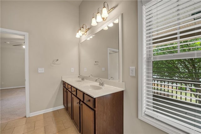559 Myrle Trace Ln, Suwanee, GA 30024 - full bath with plenty of natural light, double vanity, tile patterned floors, and baseboards