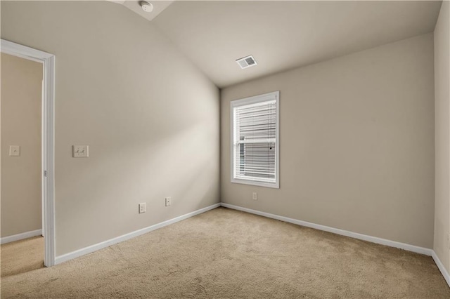 559 Myrle Trace Ln, Suwanee, GA 30024 - spare room with light colored carpet, lofted ceiling, baseboards, and a smoke detector