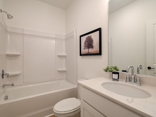 full bathroom featuring tub / shower combination, toilet, and vanity