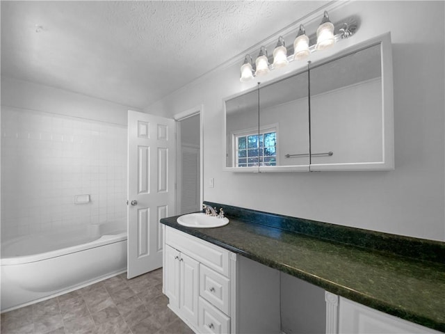 8005 Bamby Ln, Jonesboro, GA 30236 - full bathroom with a textured ceiling, shower / bathtub combination, and vanity