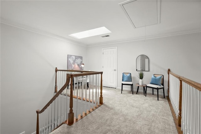 1050 Shady Valley Pl, Atlanta, GA 30324 - hallway with attic access, an upstairs landing, crown molding, carpet floors, and baseboards