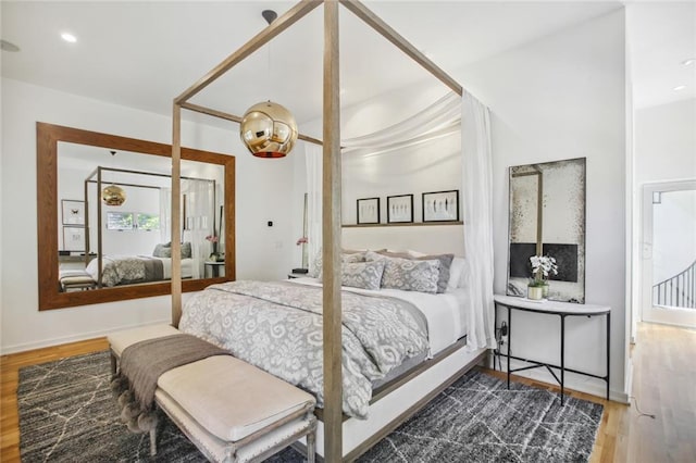 bedroom featuring wood-type flooring