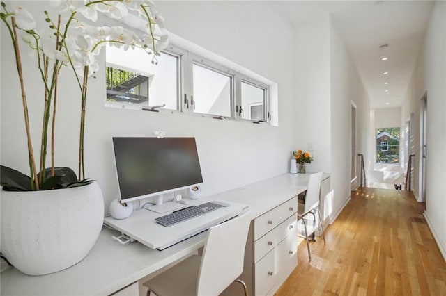 office space featuring light wood-type flooring