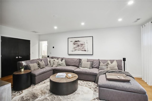 living room with light hardwood / wood-style floors