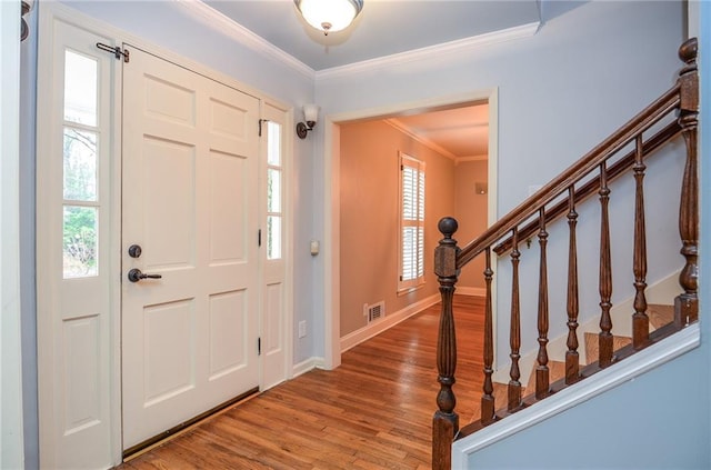 970 Winding Creek Trl, Sandy Springs, GA 30328 - entryway with wood finished floors, ornamental molding, and stairway