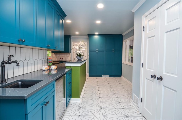 970 Winding Creek Trl, Sandy Springs, GA 30328 - kitchen featuring ornamental molding, tasteful backsplash, recessed lighting, blue cabinetry, and dark stone countertops