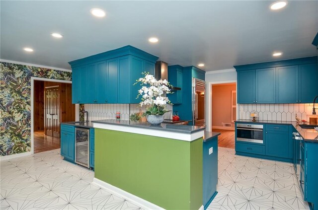 970 Winding Creek Trl, Sandy Springs, GA 30328 - kitchen with beverage cooler, oven, ornamental molding, recessed lighting, and dark countertops