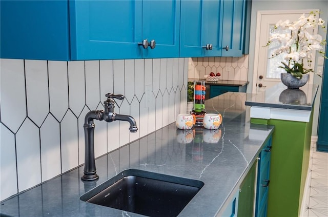 970 Winding Creek Trl, Sandy Springs, GA 30328 - kitchen with backsplash and blue cabinetry