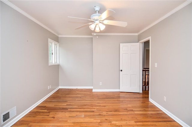 970 Winding Creek Trl, Sandy Springs, GA 30328 - unfurnished room with a ceiling fan, light wood-type flooring, and crown molding