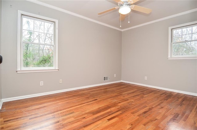 970 Winding Creek Trl, Sandy Springs, GA 30328 - spare room featuring wood finished floors, plenty of natural light, crown molding, and ceiling fan