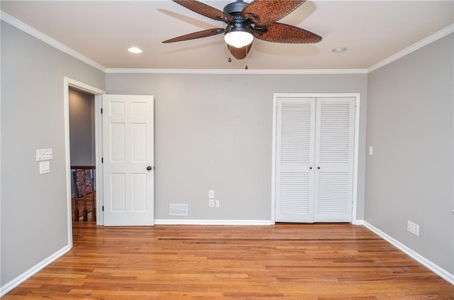 970 Winding Creek Trl, Sandy Springs, GA 30328 - unfurnished bedroom with light wood finished floors, crown molding, recessed lighting, a closet, and a ceiling fan
